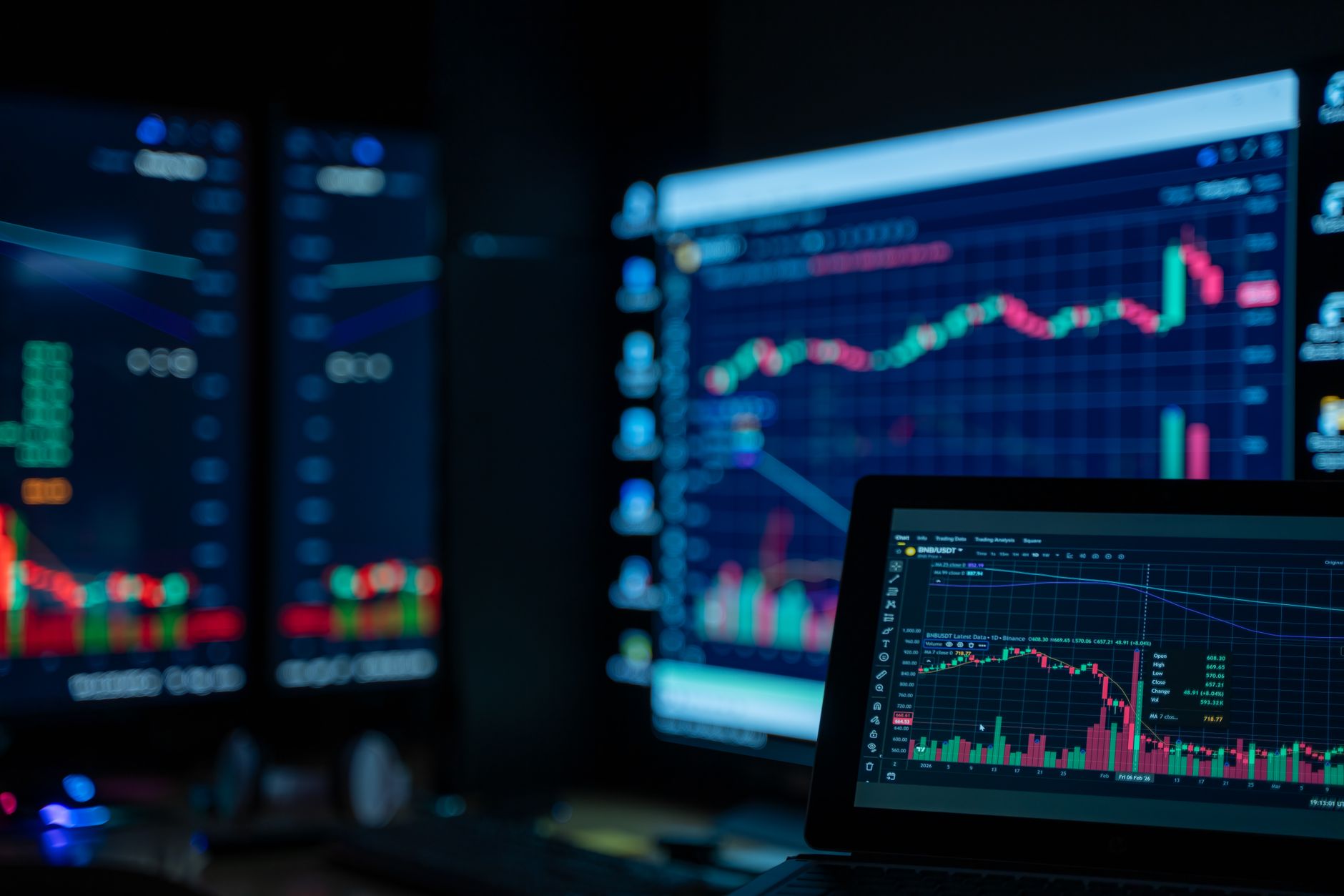 Trader monitoring stock market screens during a rally session