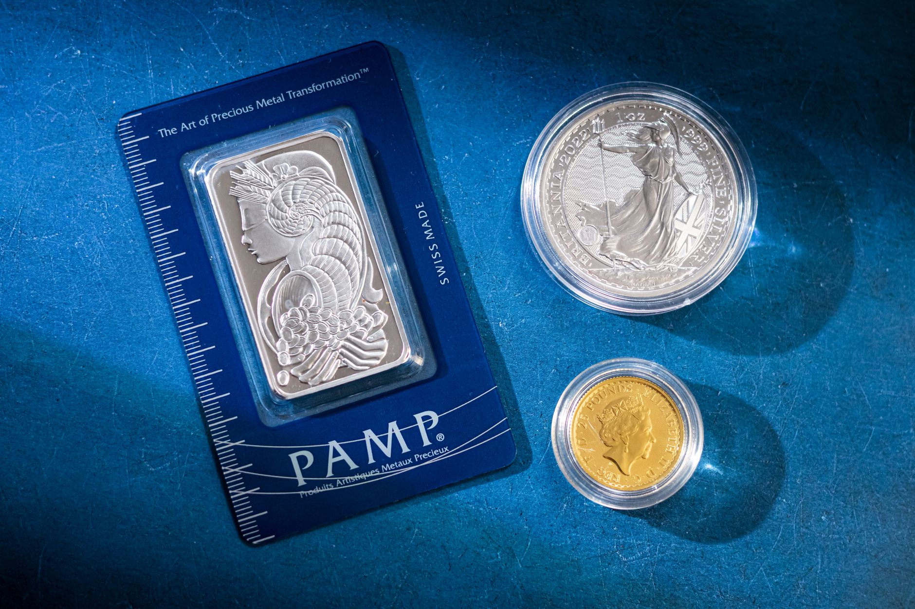 Stacked gold bars in a secure vault representing traditional store of value