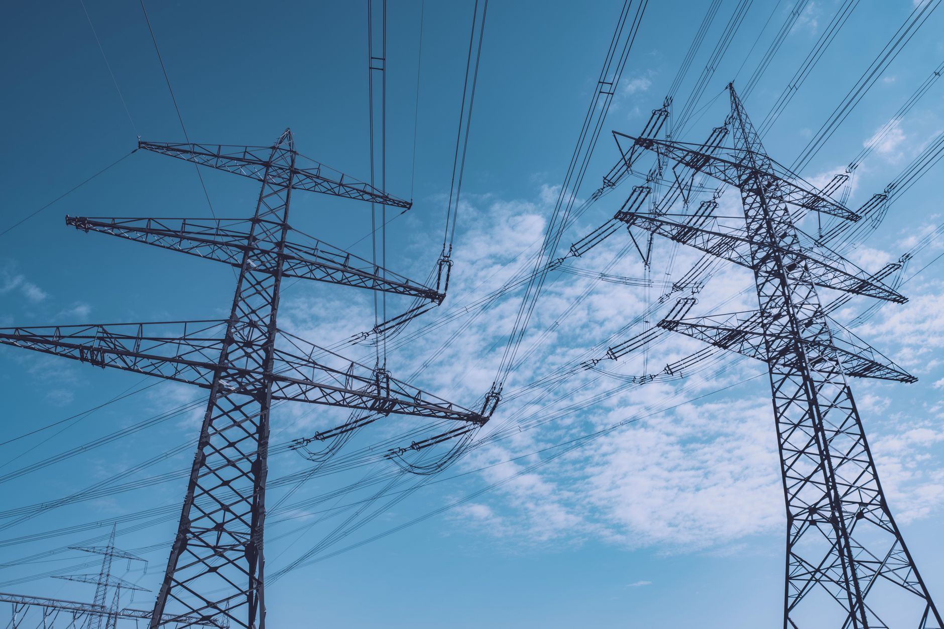 High-voltage power transmission lines and substations supplying electricity