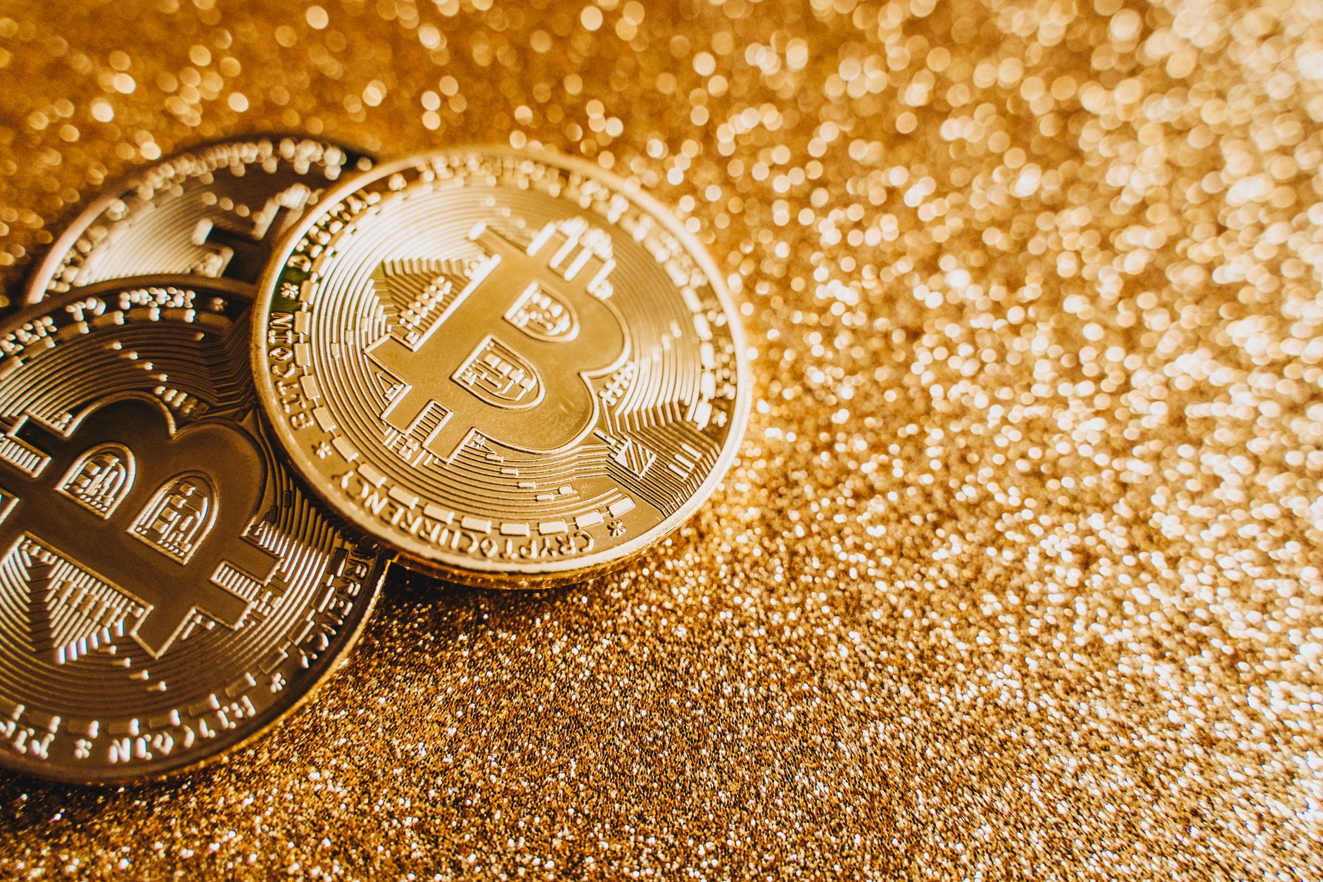 Physical Bitcoin coin representing cryptocurrency as an alternative asset during Fed uncertainty