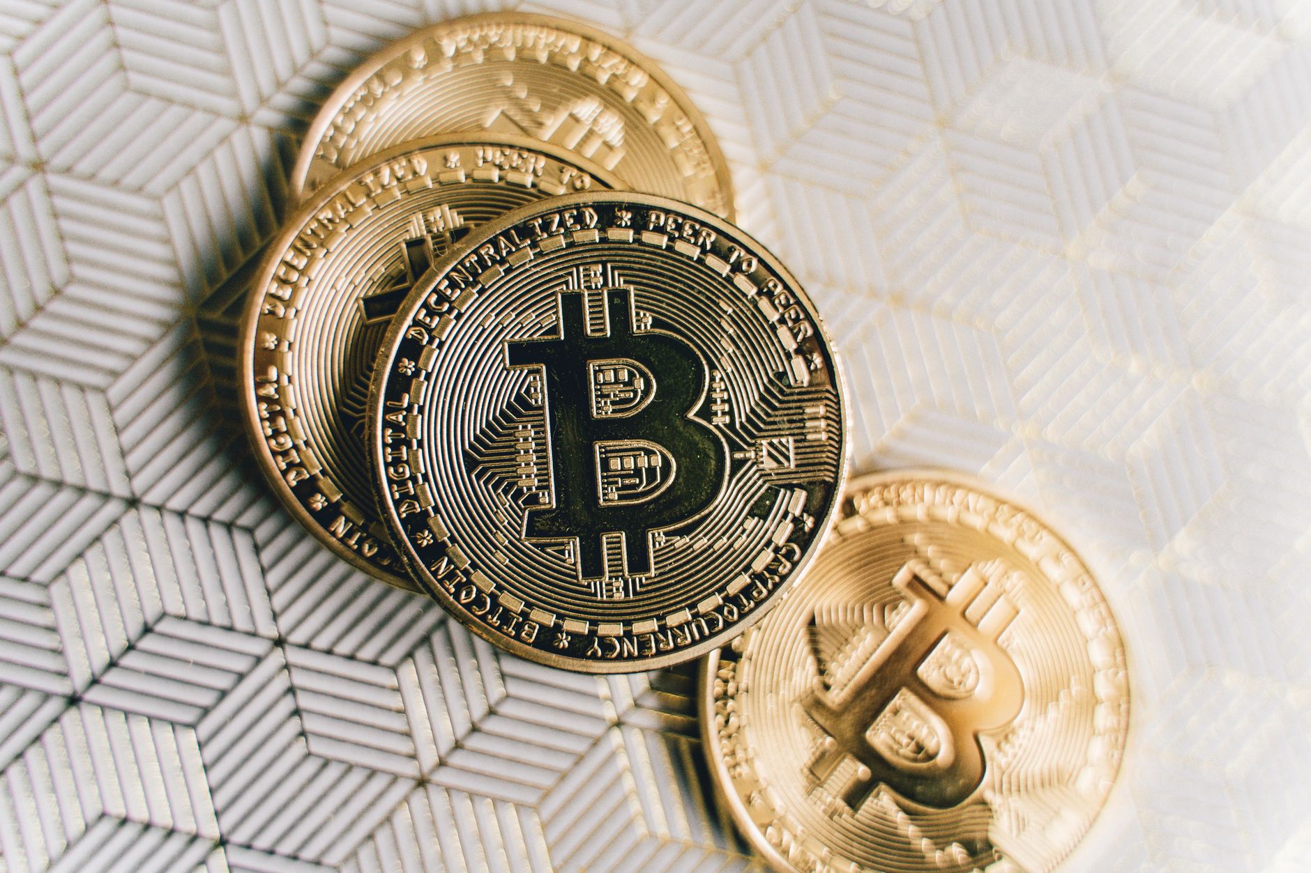 Bitcoin coin on a financial background reflecting market uncertainty after Fed tightening decision