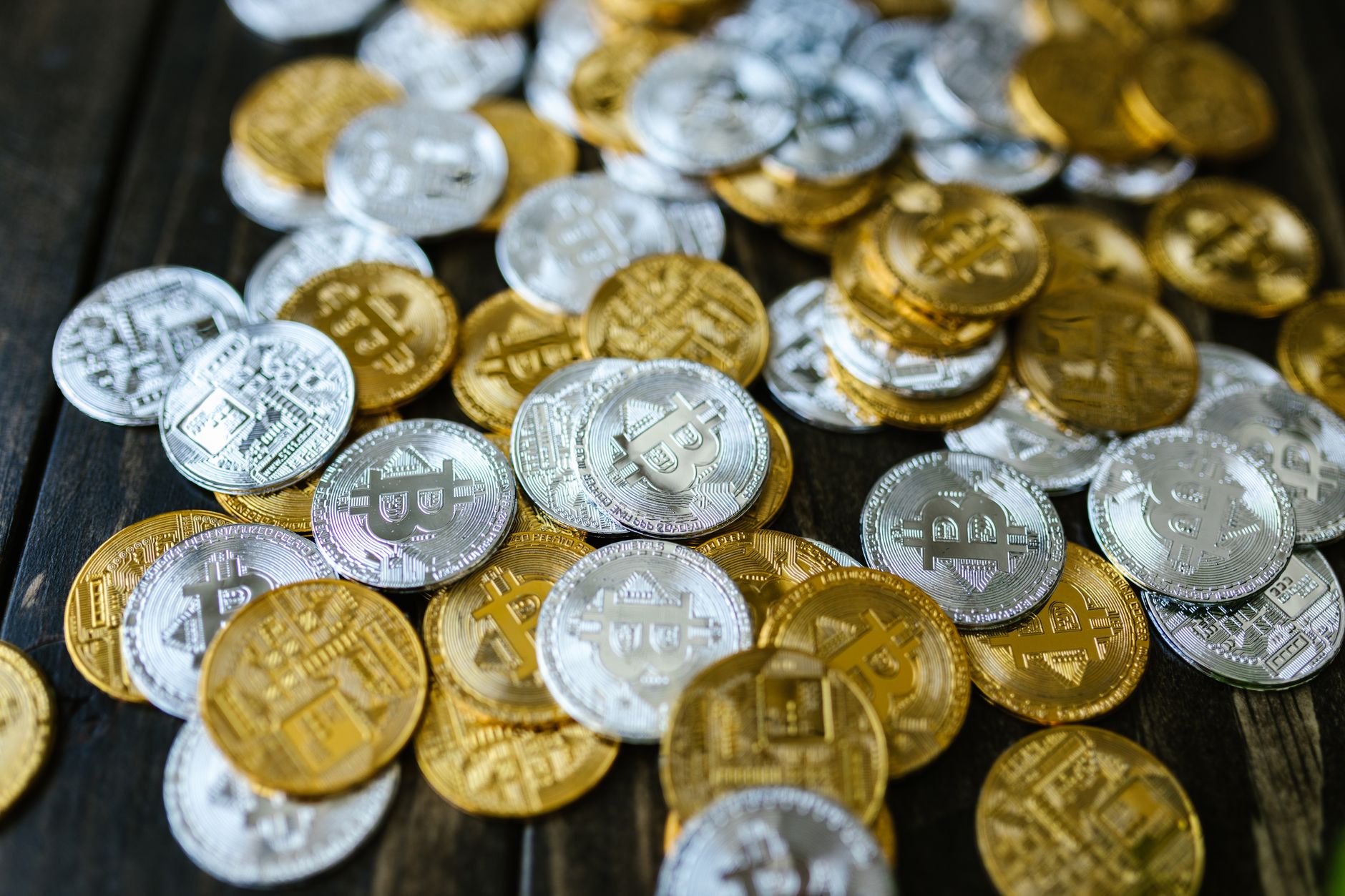 Close-up of a digital coin representing cryptocurrency asset movement