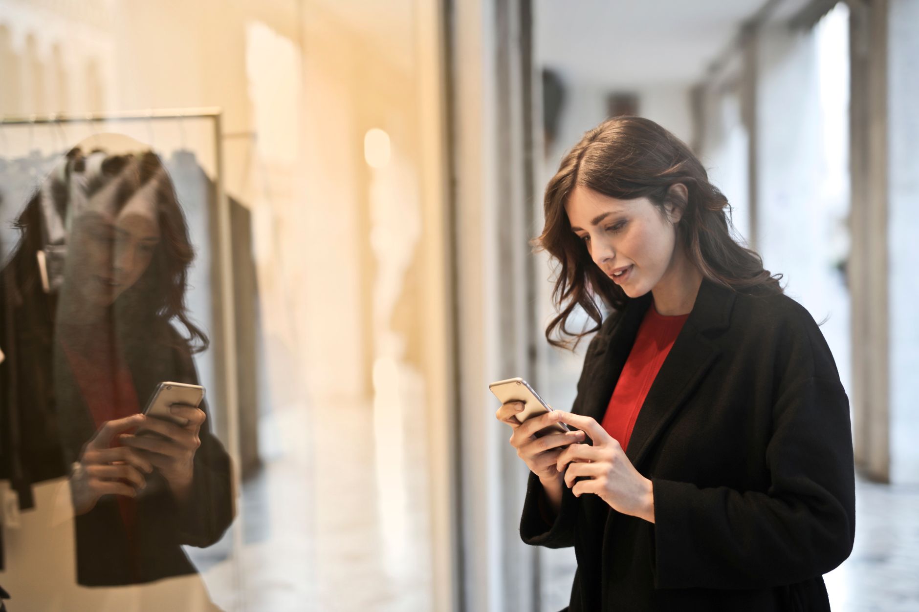 Retail investor checking Bitcoin price on a smartphone