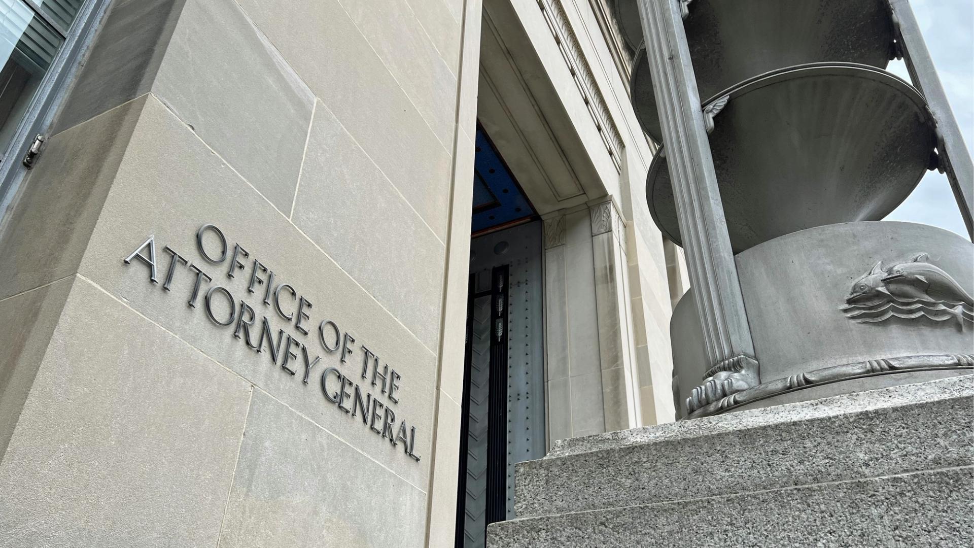 Handcuffs resting on financial documents representing insider trading charges